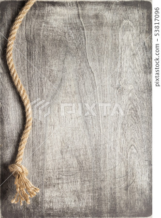 ship rope at wooden board background ship rope at wooden board background 53817096