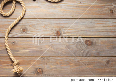 ship rope at wooden background texture ship rope at wooden background texture 53817102