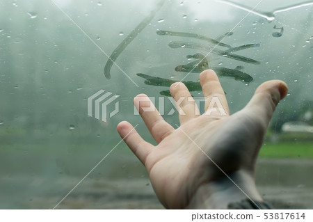 human fingers drawing on a glass car human fingers drawing on a glass car 53817614