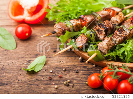 Grilled pork and chicken kebab with paprika Grilled pork and chicken kebab with paprika 53821535