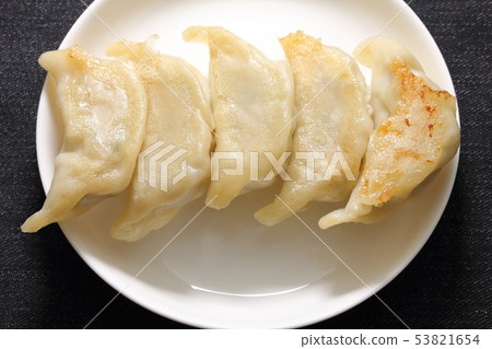 Grilled dumplings served with grilled surface on top. 53821654
