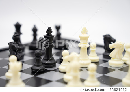 chessboard with a chess piece on the back chessboard with a chess piece on the back 53821912