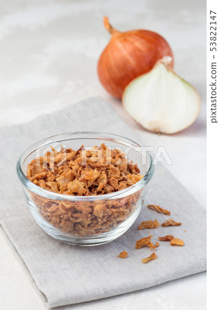 Fried onion in glass, topping for hot dog Fried onion in glass, topping for hot dog 53822147