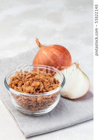 Fried onion in glass, topping for hot dog Fried onion in glass, topping for hot dog 53822148