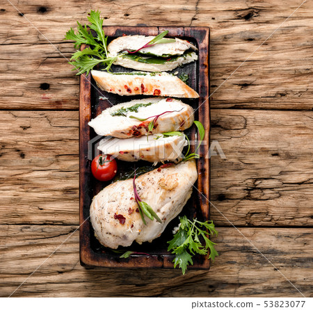 Sliced chicken breast with herb Sliced chicken breast with herb 53823077