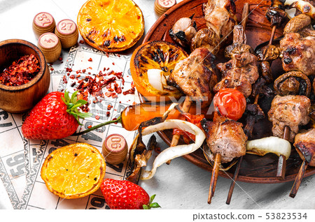 Picnic with barbecue and board game 53823534