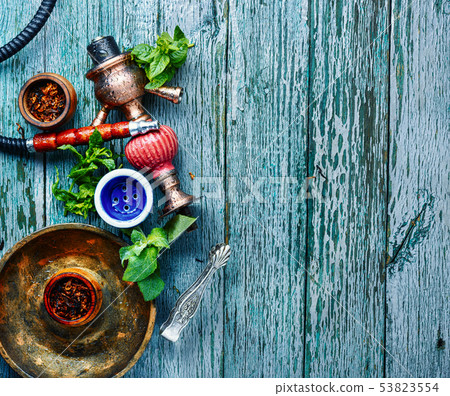 Smoking hookah with mint 53823554