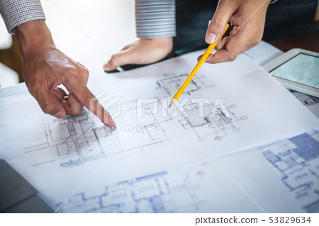 Construction engineering or architect discussing a 53829634