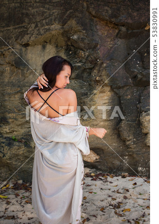 Young girl in an image geisha transparent dressing Young girl in an image geisha transparent dressing 53830991