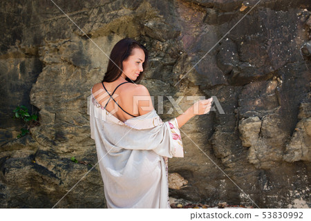 Young girl in an image geisha transparent dressing Young girl in an image geisha transparent dressing 53830992