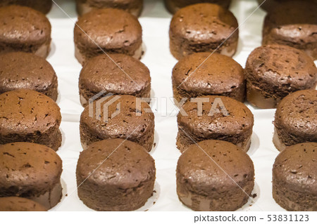 Chocolate Cup Cake arranged display in market Chocolate Cup Cake arranged display in market 53831123