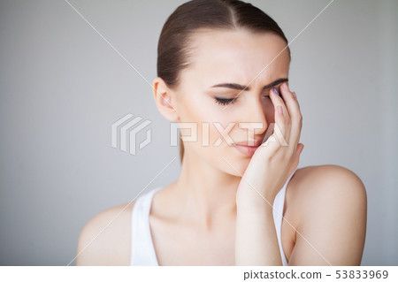 Pain Tired Exhausted Stressed Woman Suffering From Strong Eye Pain. Portrait Of A Beautiful Young Pain Tired Exhausted Stressed Woman Suffering From Strong Eye Pain. Portrait Of A Beautiful Young 53833969