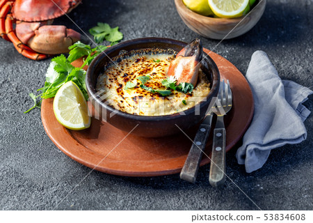 CHILEAN FOOD. Baked crabmeat crab meat with cheese, cream and bread. Traditional dish of chilean CHILEAN FOOD. Baked crabmeat crab meat with cheese, cream and bread. Traditional dish of chilean 53834608