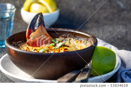 CHILEAN FOOD. Baked crabmeat crab meat with cheese, cream and bread. Traditional dish of chilean CHILEAN FOOD. Baked crabmeat crab meat with cheese, cream and bread. Traditional dish of chilean 53834639