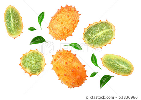 Kiwano or horned melon with leaves isolated on white background, Top view. Flat lay. Kiwano or horned melon with leaves isolated on white background, Top view. Flat lay. 53836966