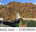Autumn leaves and dam 3 53838600
