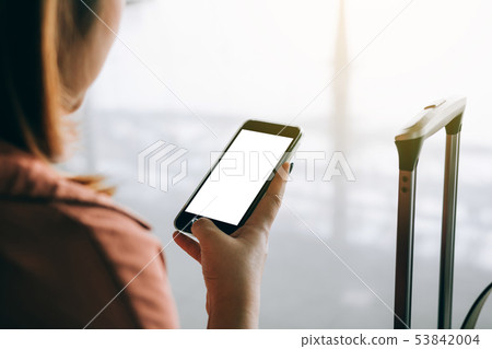 Asian tourist woman hands holding and using Asian tourist woman hands holding and using 53842004