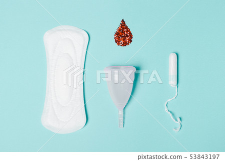 Tampon, Pad, menstrual cup with a drop of blood on Tampon, Pad, menstrual cup with a drop of blood on 53843197