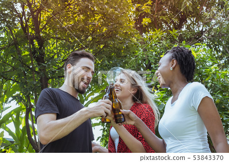 Cheers, Group of people cheering with beer for 53843370
