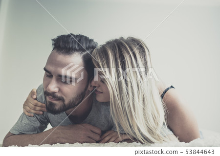 Loving happy couple in love smile and hug each Loving happy couple in love smile and hug each 53844643