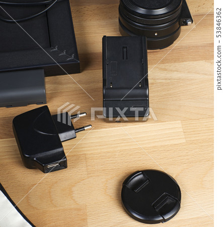 adapter and lens on the table. the photo 53846362