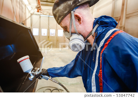 Varnisher in industrial metal factory Varnisher in industrial metal factory 53847742