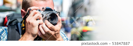 Tourist photographer taking photo in Khao san road 53847887