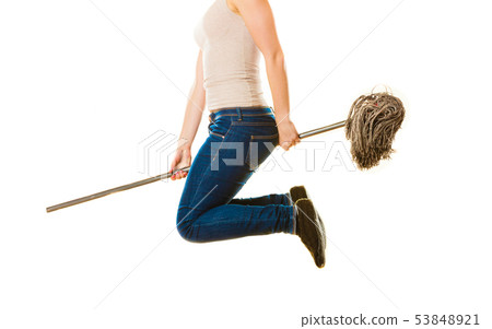 Funny cleaning woman with mop flying 53848921
