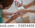 Person who does nail 53854408