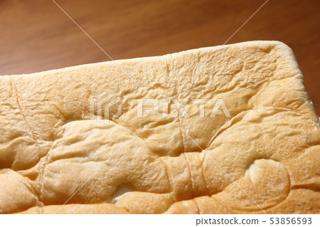 The surface of the square shaped bread is up. The surface of the square shaped bread is up. 53856593