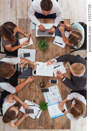 Business meeting at the table. Vertical shot Business meeting at the table. Vertical shot 53857706