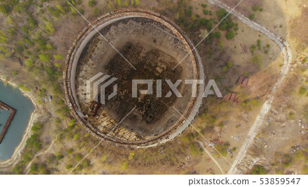 Drone flies over the cooling tower, top view Drone flies over the cooling tower, top view 53859547