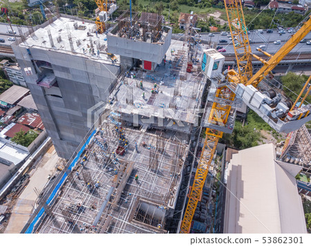 Aerial view of busy industrial construction site 53862301