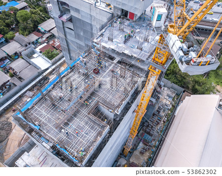 Aerial view of busy industrial construction site 53862302