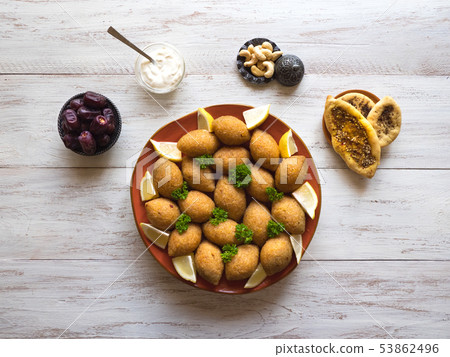 Traditional Arabic kibbeh with lamb and pine nuts 53862496