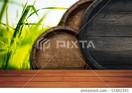 Beautiful old wooden barrels on a creative Beautiful old wooden barrels on a creative 53862561