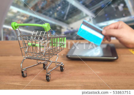 Credit card or debit card on trolley ,shopping 53863751