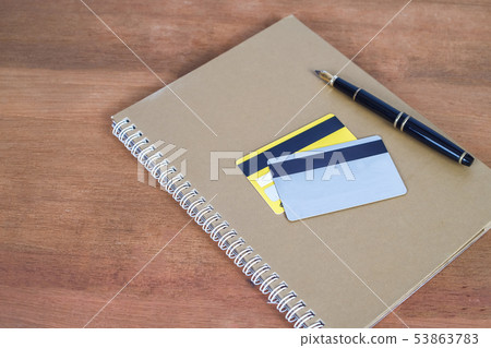 Credit card or debit card on working table Credit card or debit card on working table 53863783