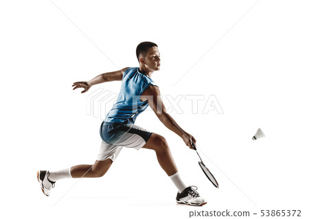 Little boy playing badminton isolated on white studio background Little boy playing badminton isolated on white studio background 53865372
