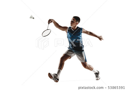 Little boy playing badminton isolated on white studio background Little boy playing badminton isolated on white studio background 53865391
