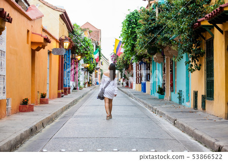 Woman walking at the walled city in Cartagena Woman walking at the walled city in Cartagena 53866522