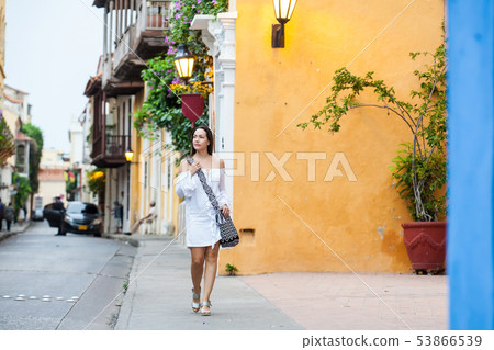 Woman walking at the walled city in Cartagena Woman walking at the walled city in Cartagena 53866539