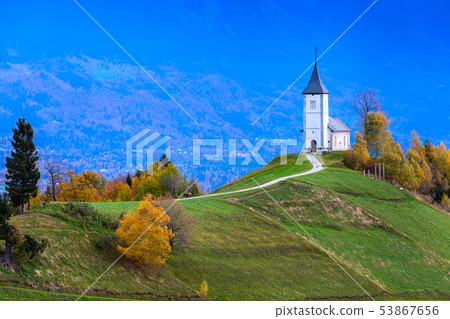 Church on top of the hill in Slovenia countryside Church on top of the hill in Slovenia countryside 53867656