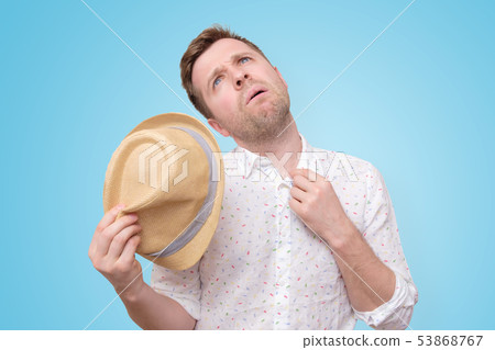 Man is worried and tired because of sweating stain 53868767