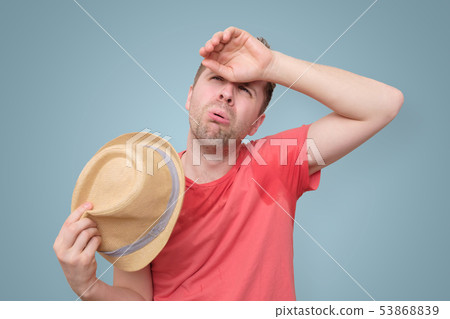 Man is worried and tired because of sweating stain 53868839