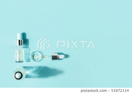 Hyaluronic acid, botulin, serum in vials. Concept of cosmetic surgery for facial rejuvenation. Hyaluronic acid, botulin, serum in vials. Concept of cosmetic surgery for facial rejuvenation. 53872114