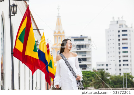 Woman walking around Cartagena de Indias Woman walking around Cartagena de Indias 53872201