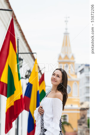 Woman walking around Cartagena de Indias Woman walking around Cartagena de Indias 53872206