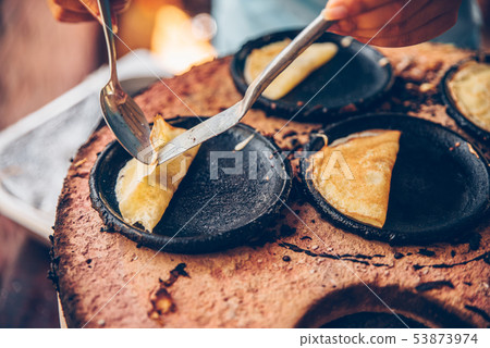 Vietnamese small rice pancake - Traditional food at the middle of Vietnam Vietnamese small rice pancake - Traditional food at the middle of Vietnam 53873974