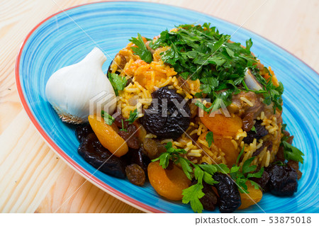 Pilau with lamb, dried plums and apricots Pilau with lamb, dried plums and apricots 53875018